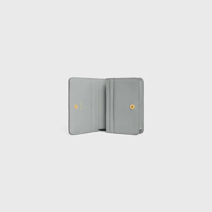 Triomphe Compact Wallet In Shiny Calfskin Pearl Blue Women CELINE WALLETS Triomphe Compact Wallet In Shiny Calfskin Pearl Blue Women CELINE WALLETS